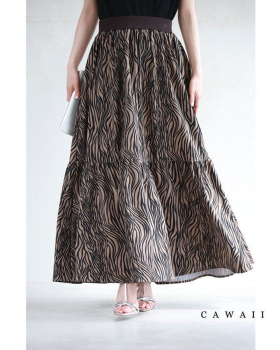 A long skirt with a fluttering animal print art style