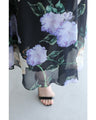 A sheer floral mini dress with a translucent feel