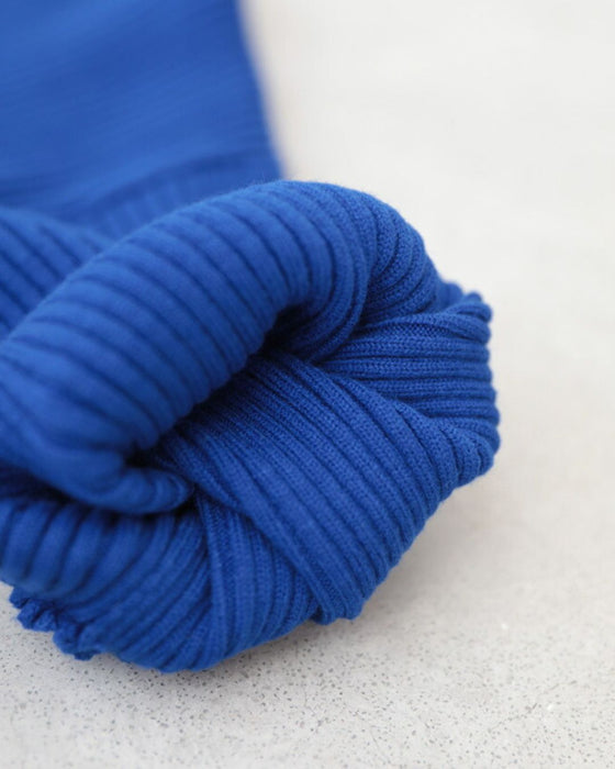 長袖ポワンとオフネックのニットトップス