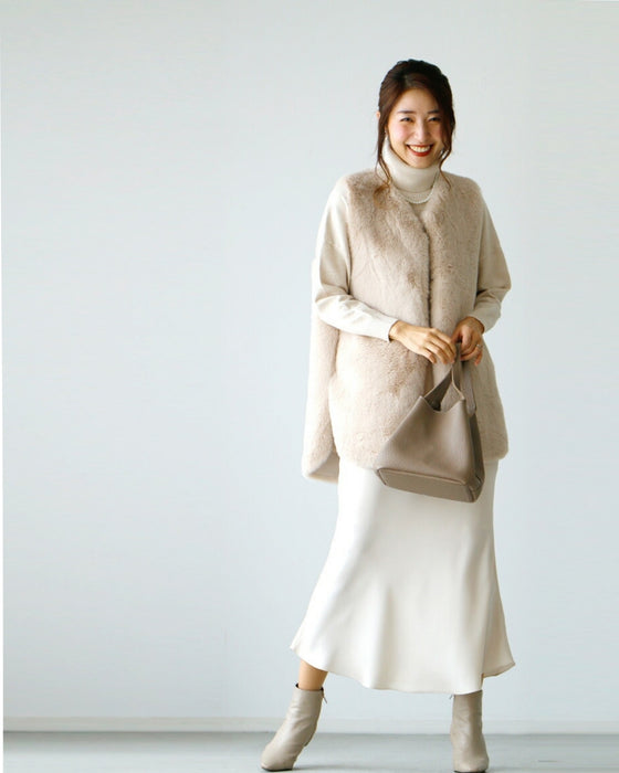 Brighten up your outfit! A reversible fur vest that will help you transition from autumn to winter