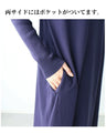 A loose, slender-looking long knit dress