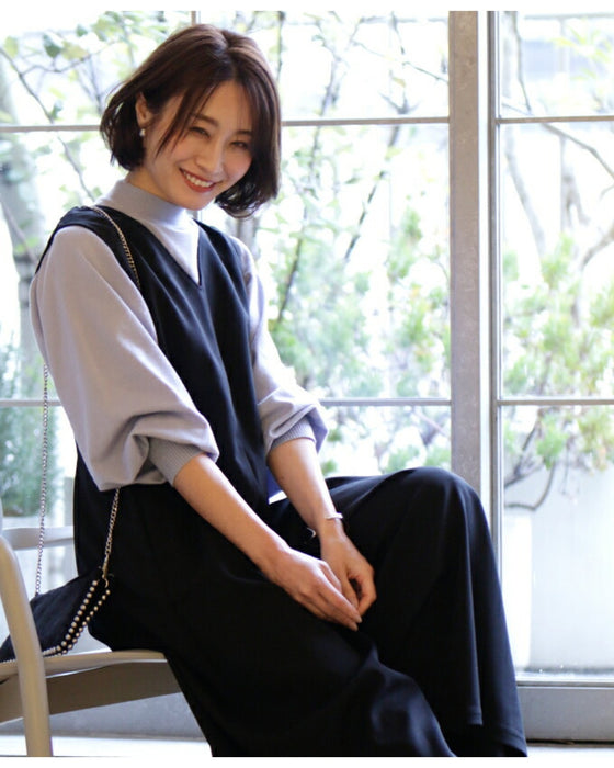 A feminine, evolved version of the turtleneck knit