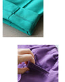 Stain-resistant colored tuck pants