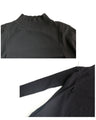 A loose, slender-looking long knit dress