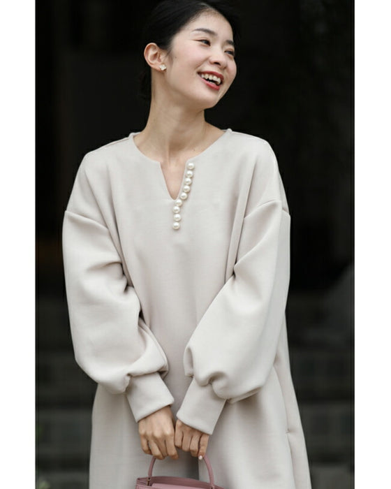 艶めくパールが流れるロングワンピース