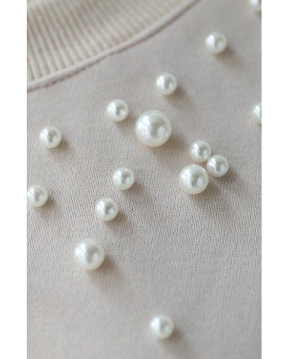 A sweatshirt top with bubble pearls that bubble up like bubbles
