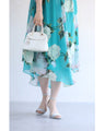A sheer floral mini dress with a translucent feel