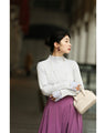 Optical illusion shadow line knit