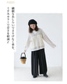 A thin cardigan with delicate floral embroidery