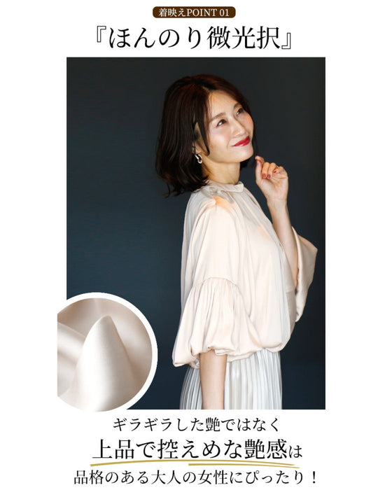 A glossy shirred blouse with 3/4 sleeves and long sleeves for a stylish look