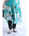 A sheer floral mini dress with a translucent feel