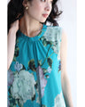 A sheer floral mini dress with a translucent feel
