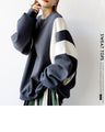 A simple yet striking oversized pullover sweatshirt
