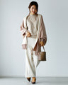 A feminine, evolved version of the turtleneck knit