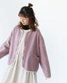 A dense and warm cardigan with a hem