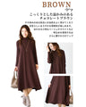 A loose, slender-looking long knit dress