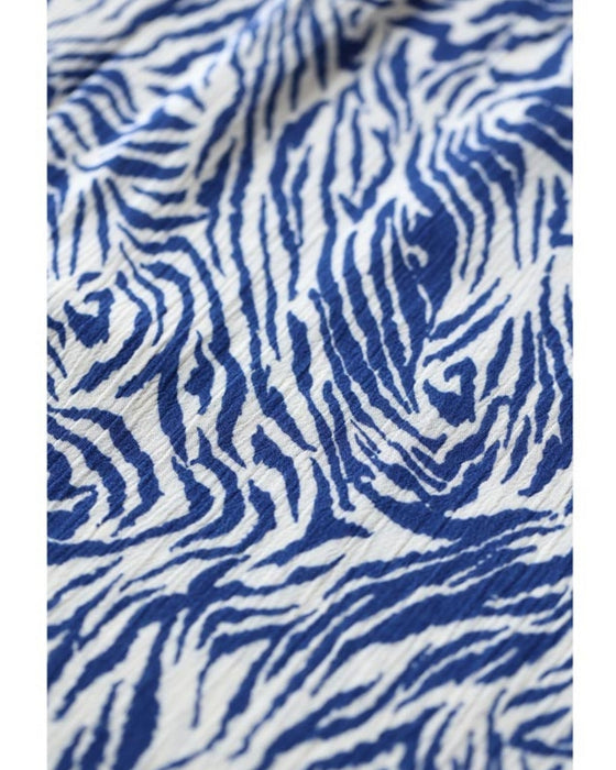 (Petticoat included) A cool and refreshing long skirt with an animal print