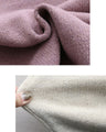 A dense and warm cardigan with a hem