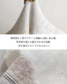 A thin cardigan with delicate floral embroidery