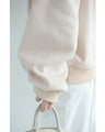 A sweatshirt top with bubble pearls that bubble up like bubbles