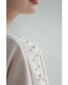 A sweatshirt top with bubble pearls that bubble up like bubbles