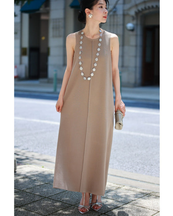 A two-piece set of a crochet top and a knit dress that will keep you cool and beautiful this summer