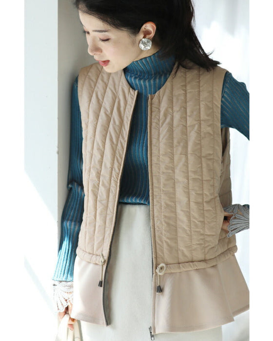 Cinderella vest that doesn't hide the cuteness of the knit