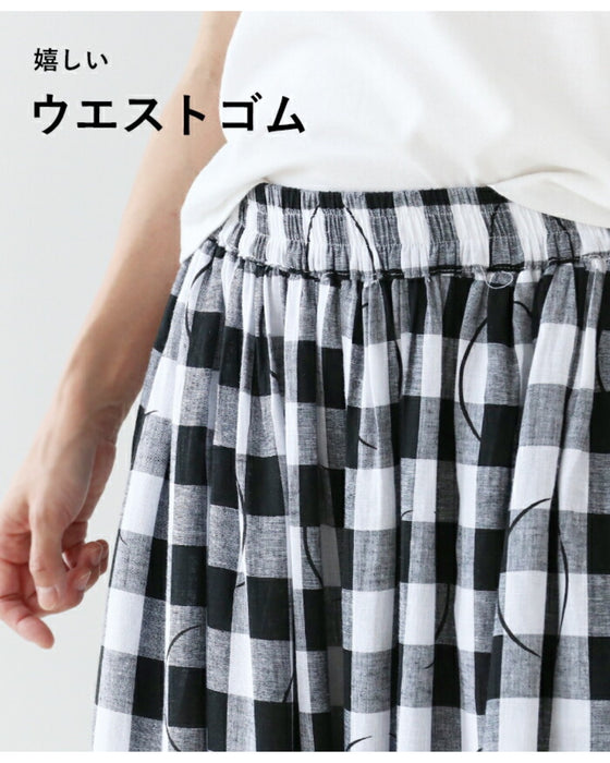 Check and half-polka dot pants