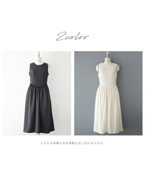 A dress with a tweed-like top and a glossy skirt, sparkling with sequins