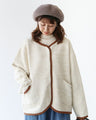 A dense and warm cardigan with a hem