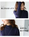 A loose, slender-looking long knit dress