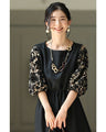 Black tuck dress with floral lace sleeves (black)