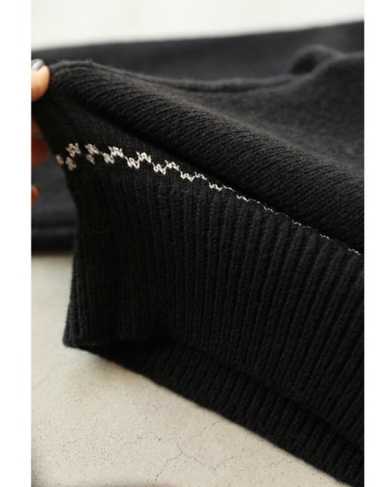 Knitted cardigan with flowers drawn with beads and jewels