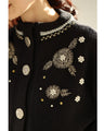 Knitted cardigan with flowers drawn with beads and jewels