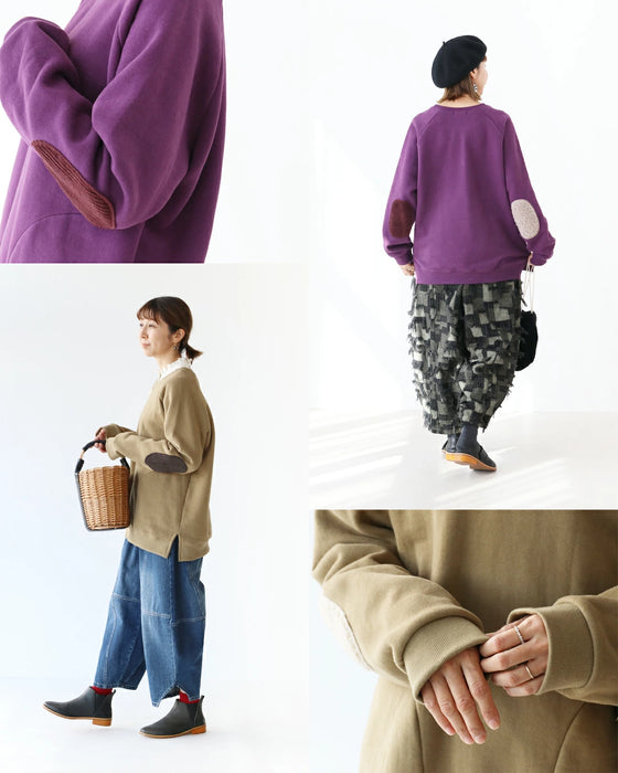 Unique asymmetric elbow patch top