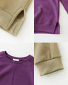 Unique asymmetric elbow patch top
