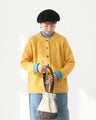 Knit cardigan with contrasting sleeves that can be worn front or back