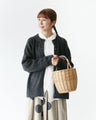 Knit cardigan with contrasting sleeves that can be worn front or back