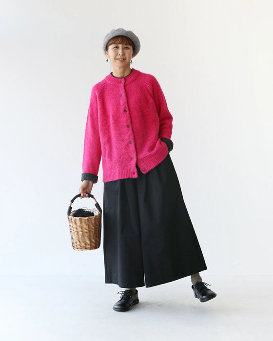 Knit cardigan with contrasting sleeves that can be worn front or back