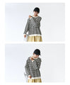 A knit top that can be worn like a sweatshirt
