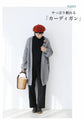 Loosely knitted cardigan with loose sleeves