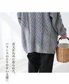 Loosely knitted cardigan with loose sleeves