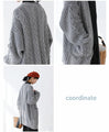 Loosely knitted cardigan with loose sleeves