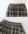 Flannel flare skirt with small flower embroidery