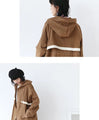 An eye-catching bicolor caramel coat