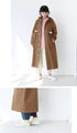 An eye-catching bicolor caramel coat