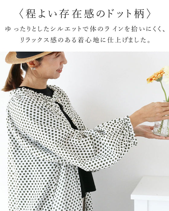 A retro polka dot dress that can also be worn as a jacket