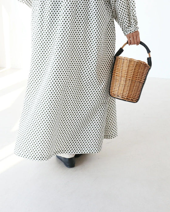 A retro polka dot dress that can also be worn as a jacket