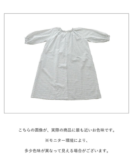 A retro polka dot dress that can also be worn as a jacket