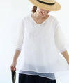 Two-tone embroidery and two-layer sheer